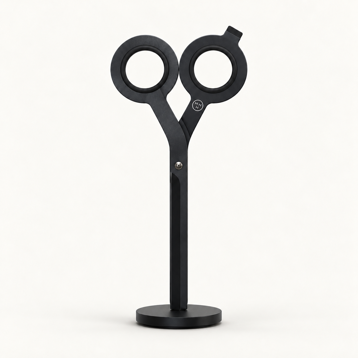 AI-generated illustration of HMM Scissors in Black, with two round handles and closed square-ended blades standing on the included circular magnetic base.